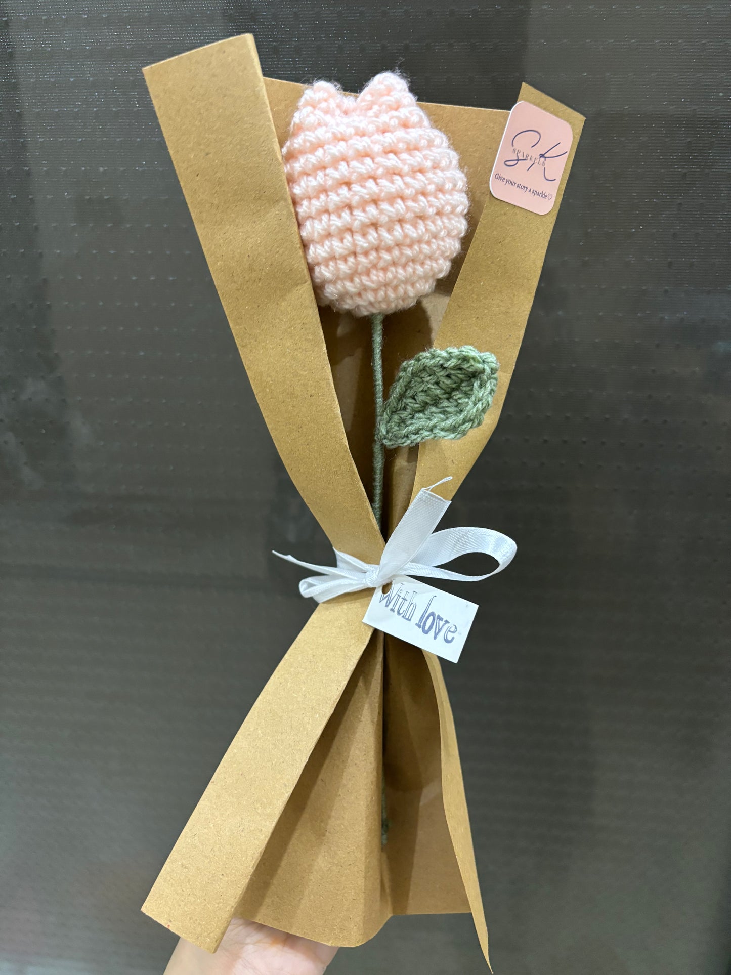 Crochet tulip with complementary khaaki wrapping