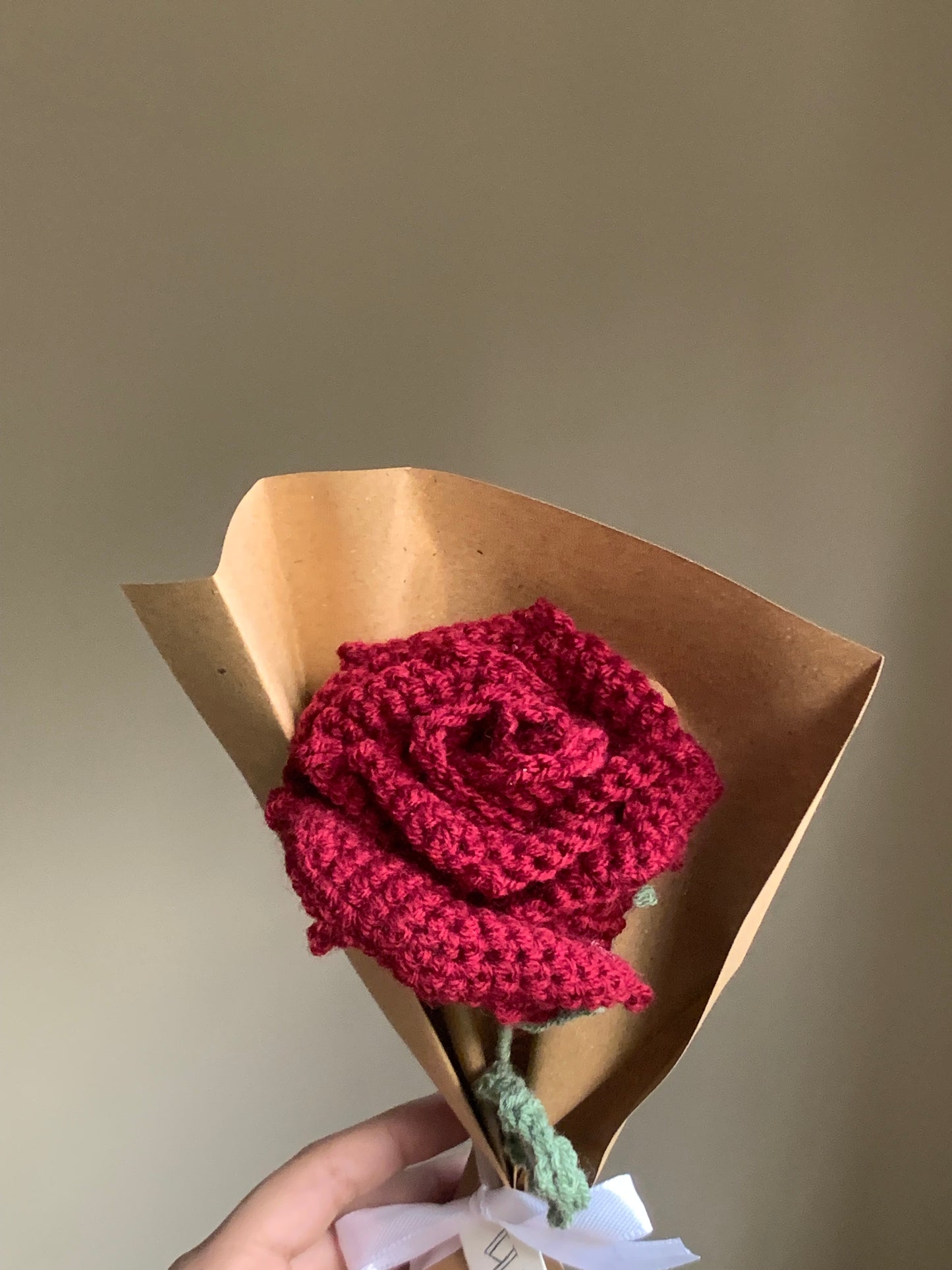 Crochet single petal rose with complementary khaaki wrapping