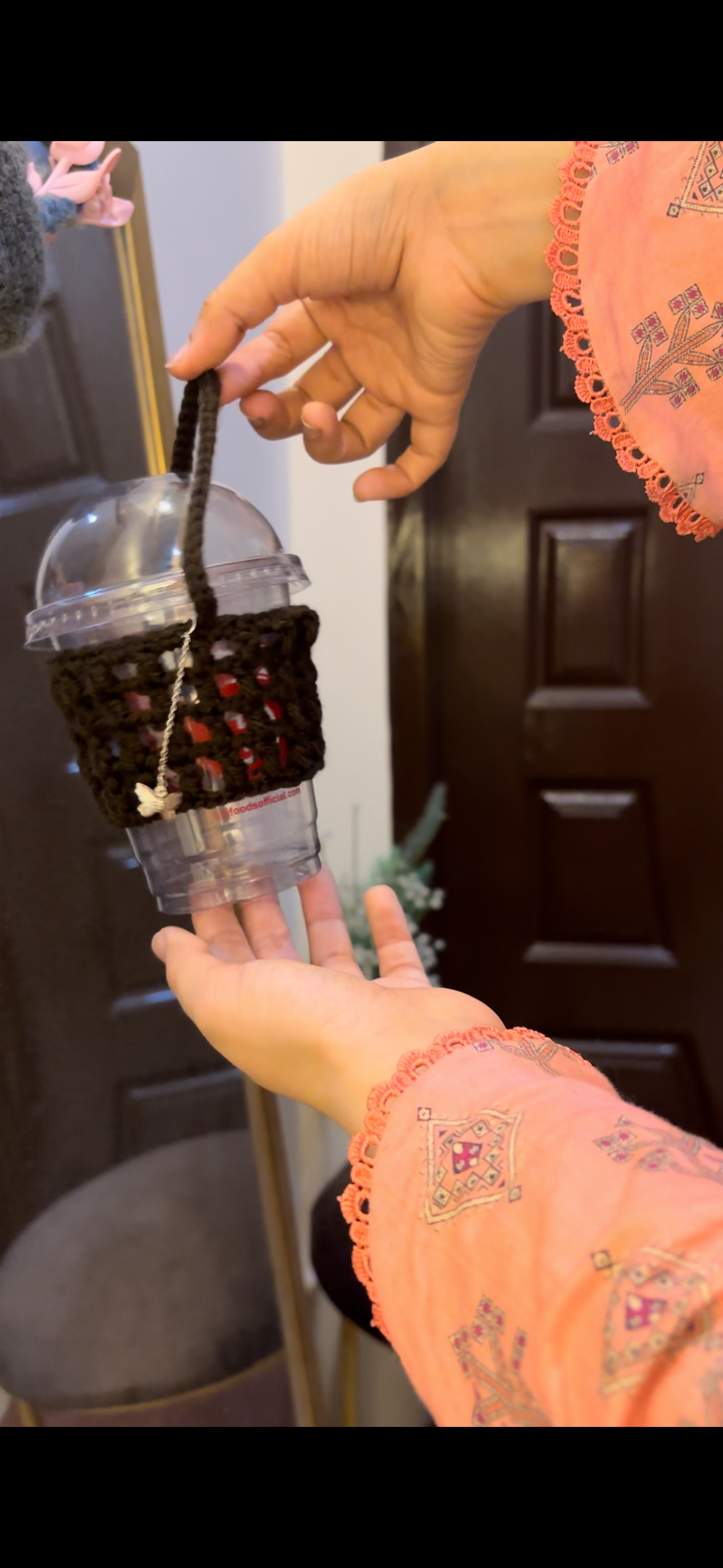 Crochet mesh cup holder with butterfly charm