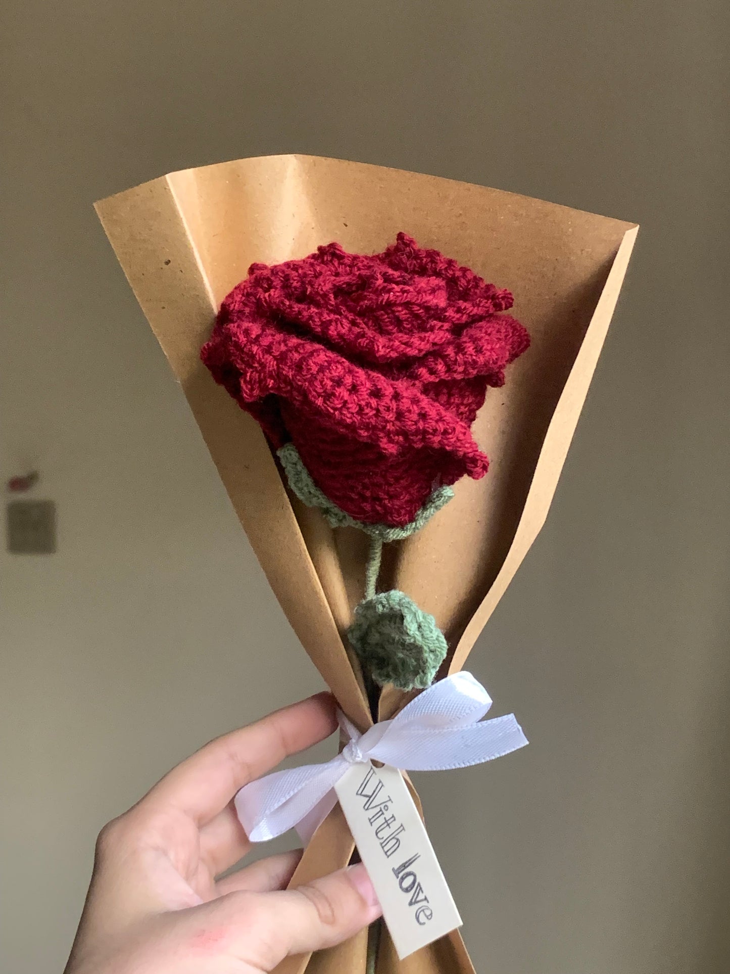 Crochet single petal rose with complementary khaaki wrapping