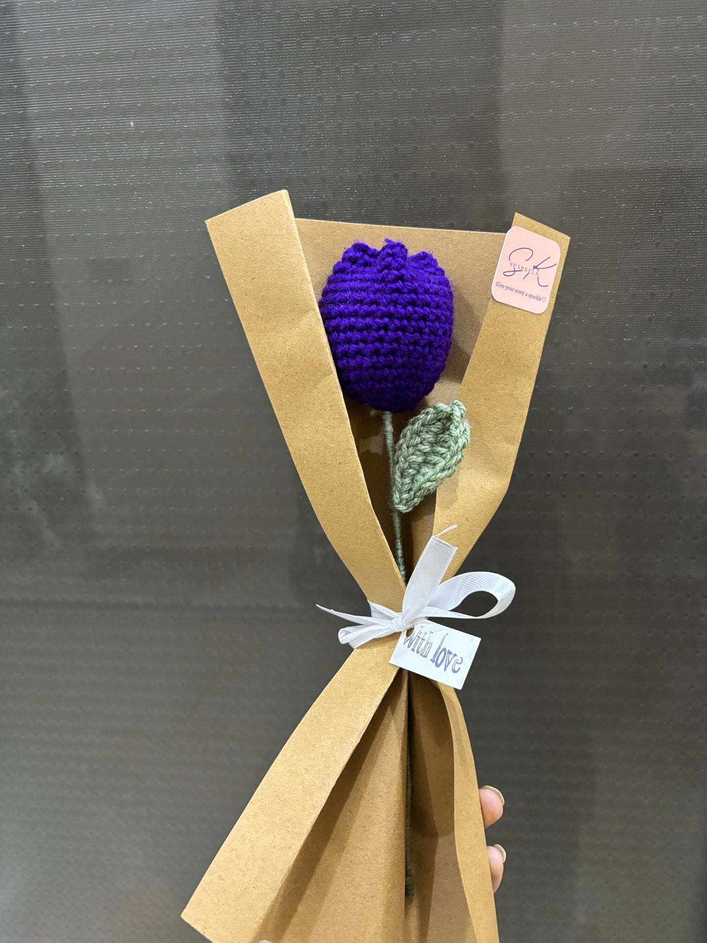 Crochet tulip with complementary khaaki wrapping
