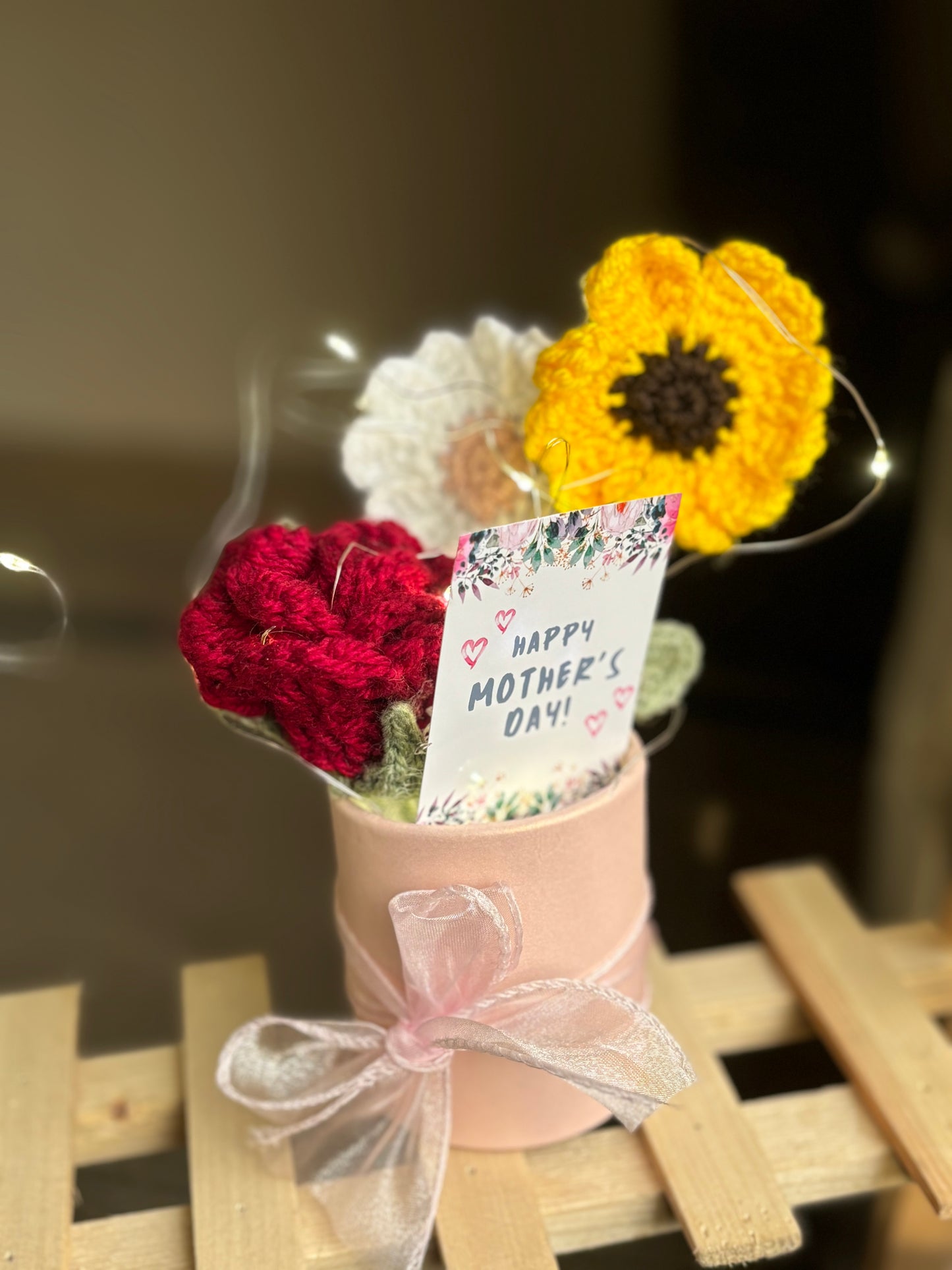 Mini bucket with crochet flowers