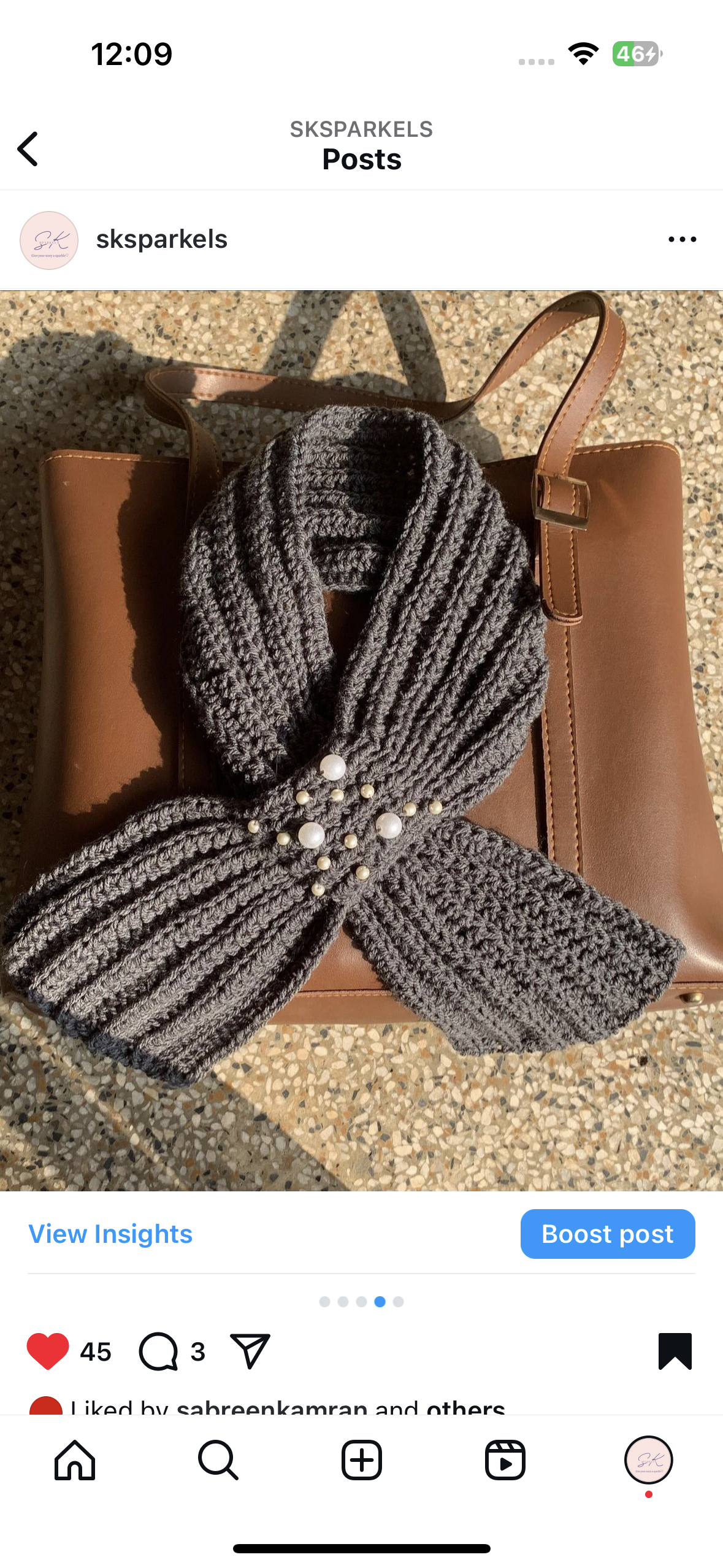 Crochet bow muffler embellished with pearls