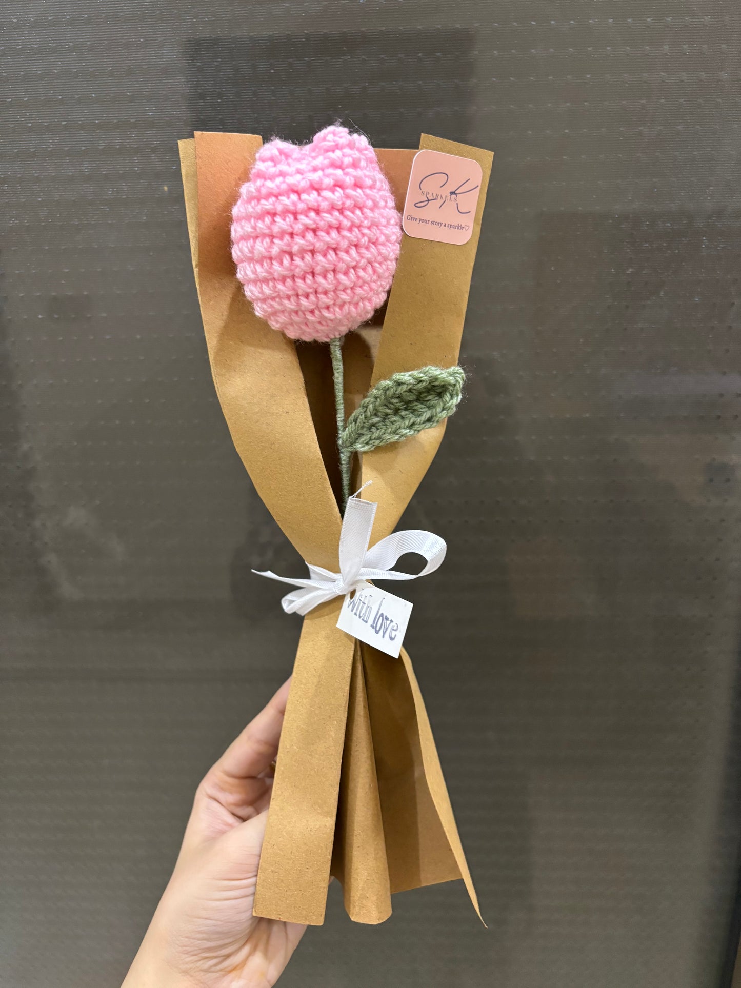 Crochet tulip with complementary khaaki wrapping
