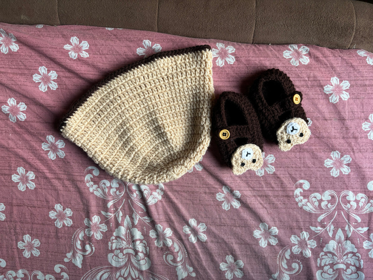 Crochet baby shoes and cap set
