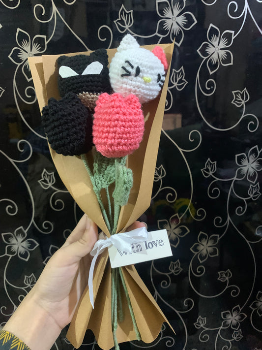 Crochet batman hello kitty themed flowers with complementary khaaki wrapping