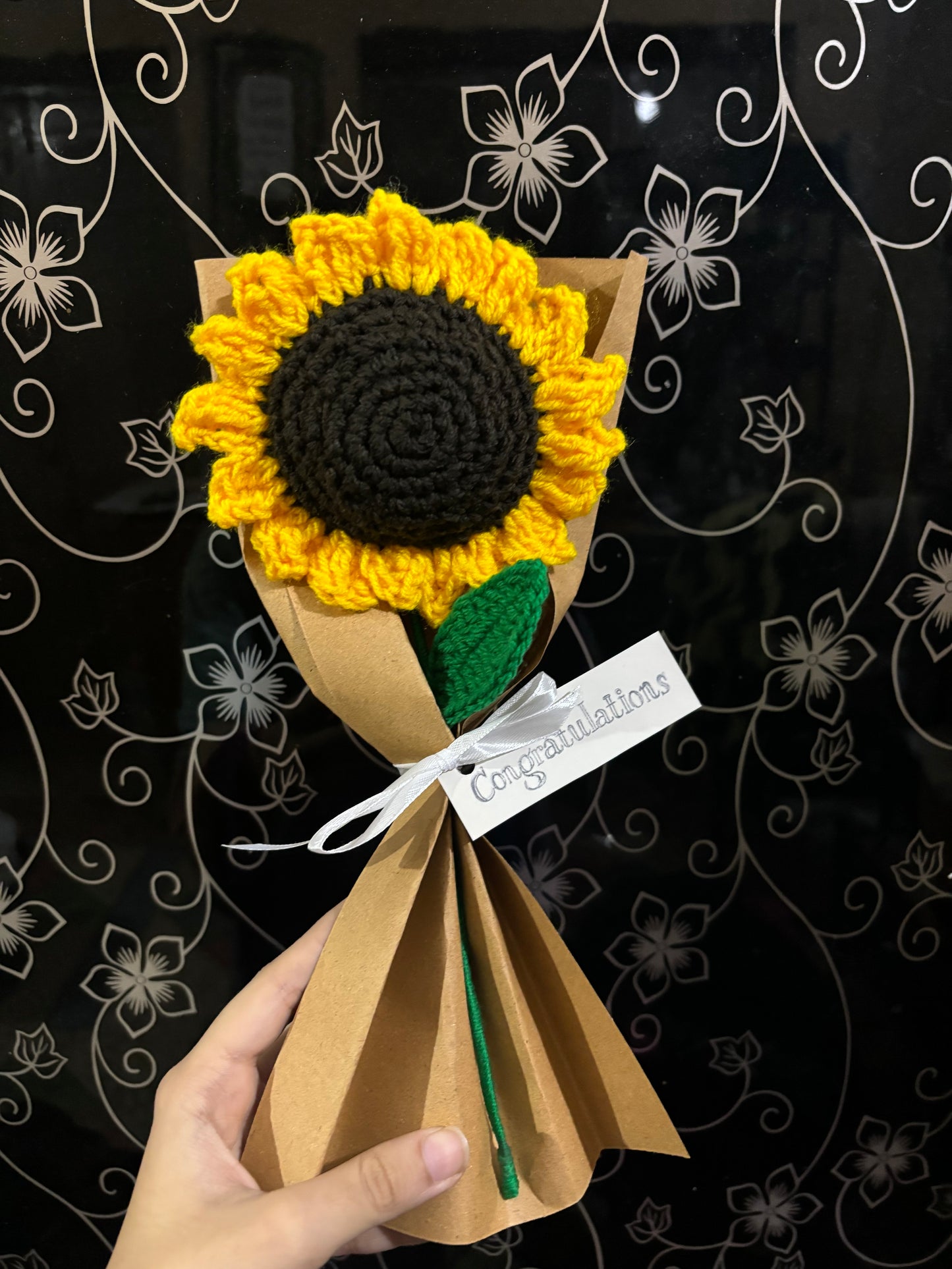 Crochet sunflower with complementary khaaki wrapping