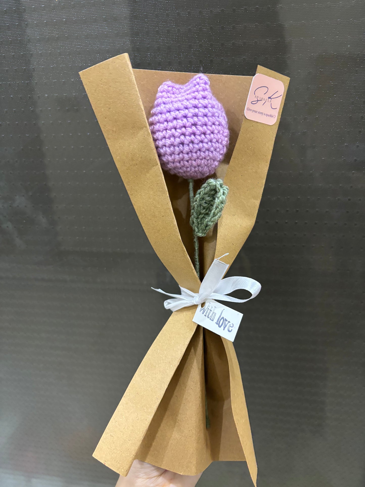 Crochet tulip with complementary khaaki wrapping