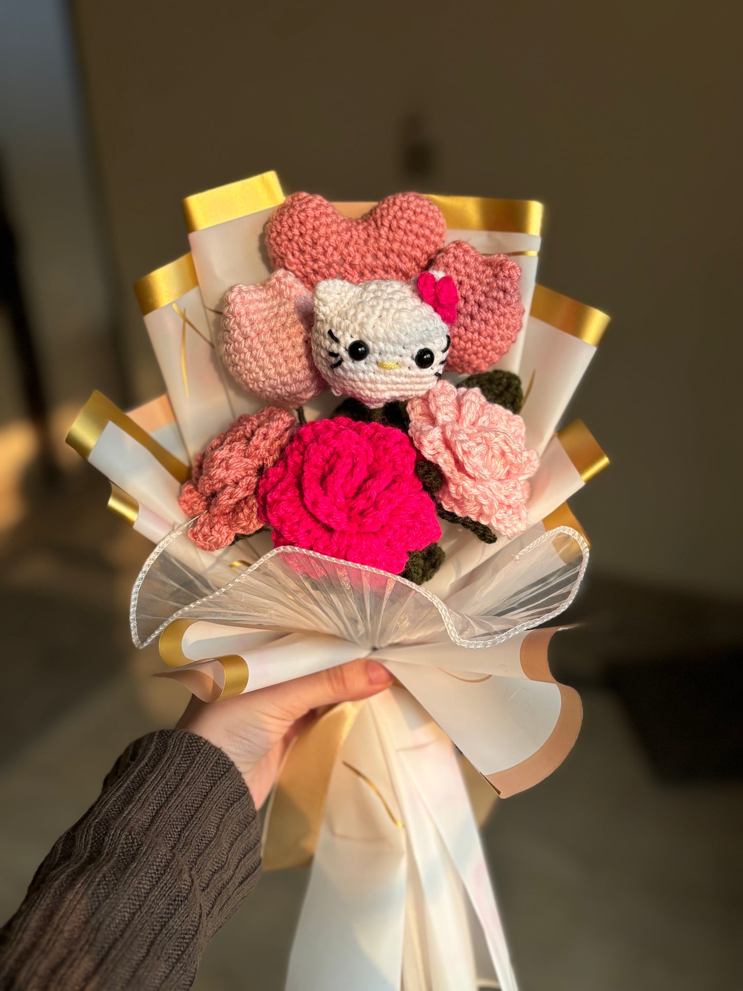 Crochet hello kitty themed bouquet with roses tulips and heart