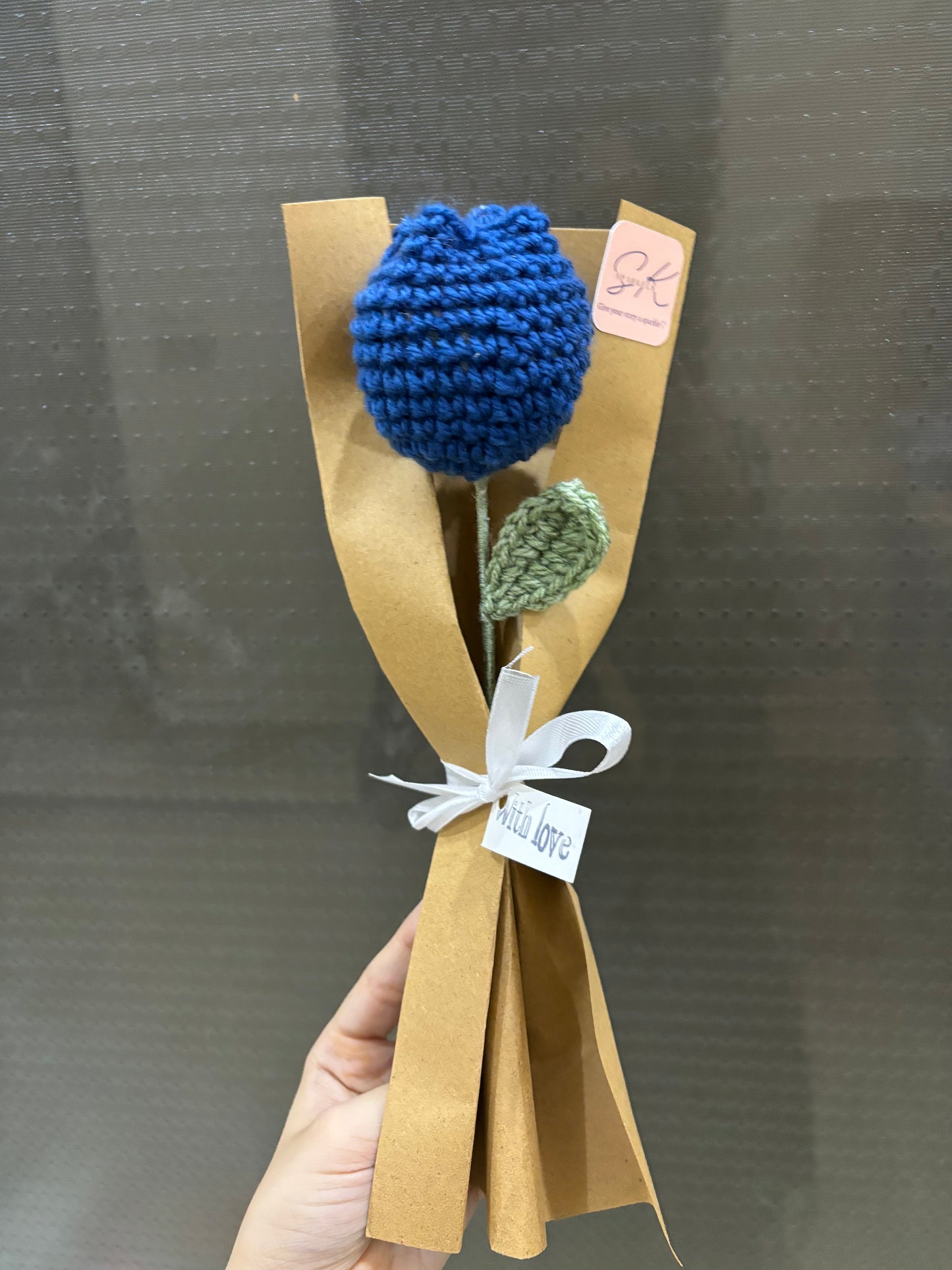 Crochet tulip with complementary khaaki wrapping