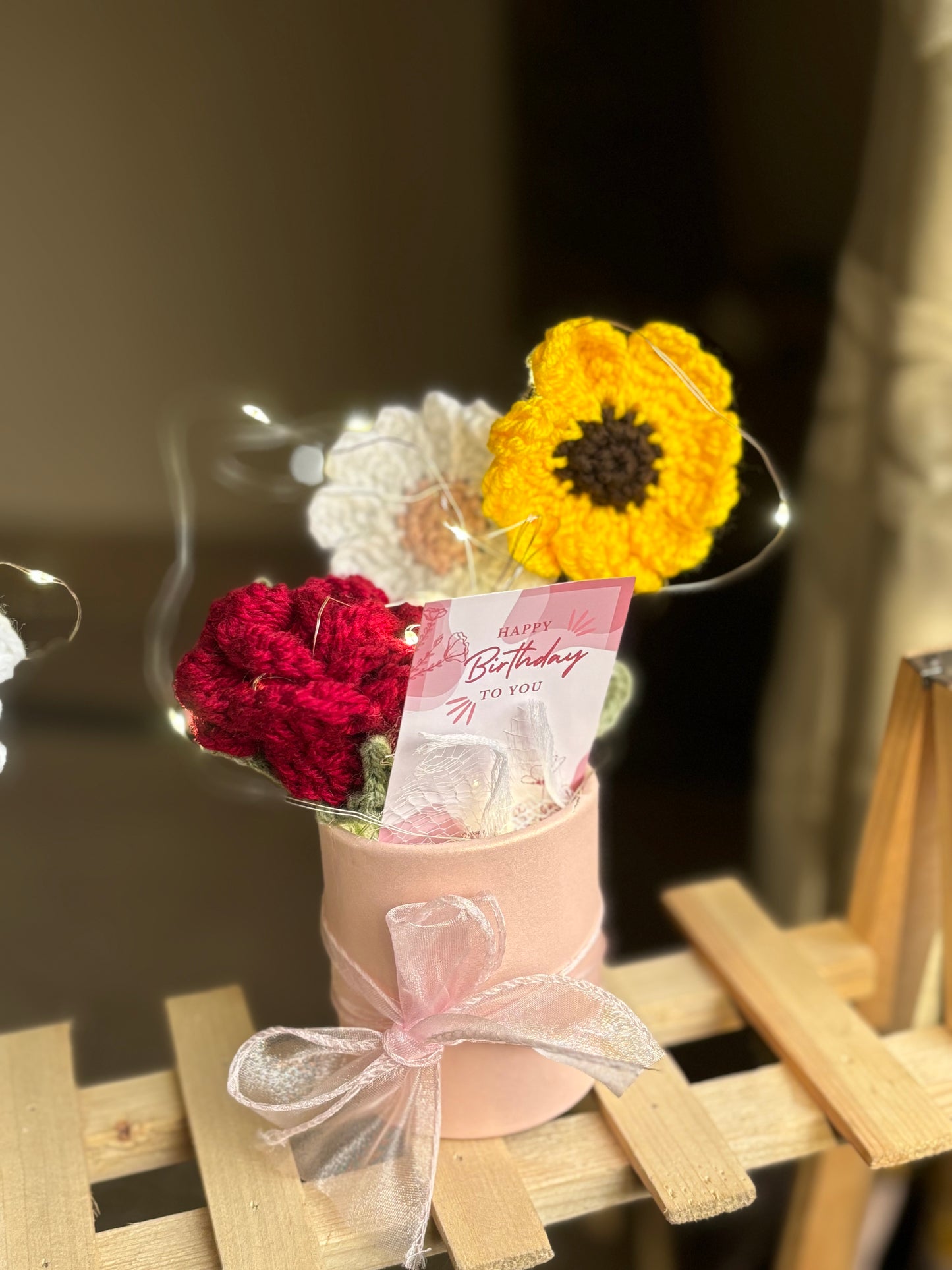 Mini bucket with crochet flowers