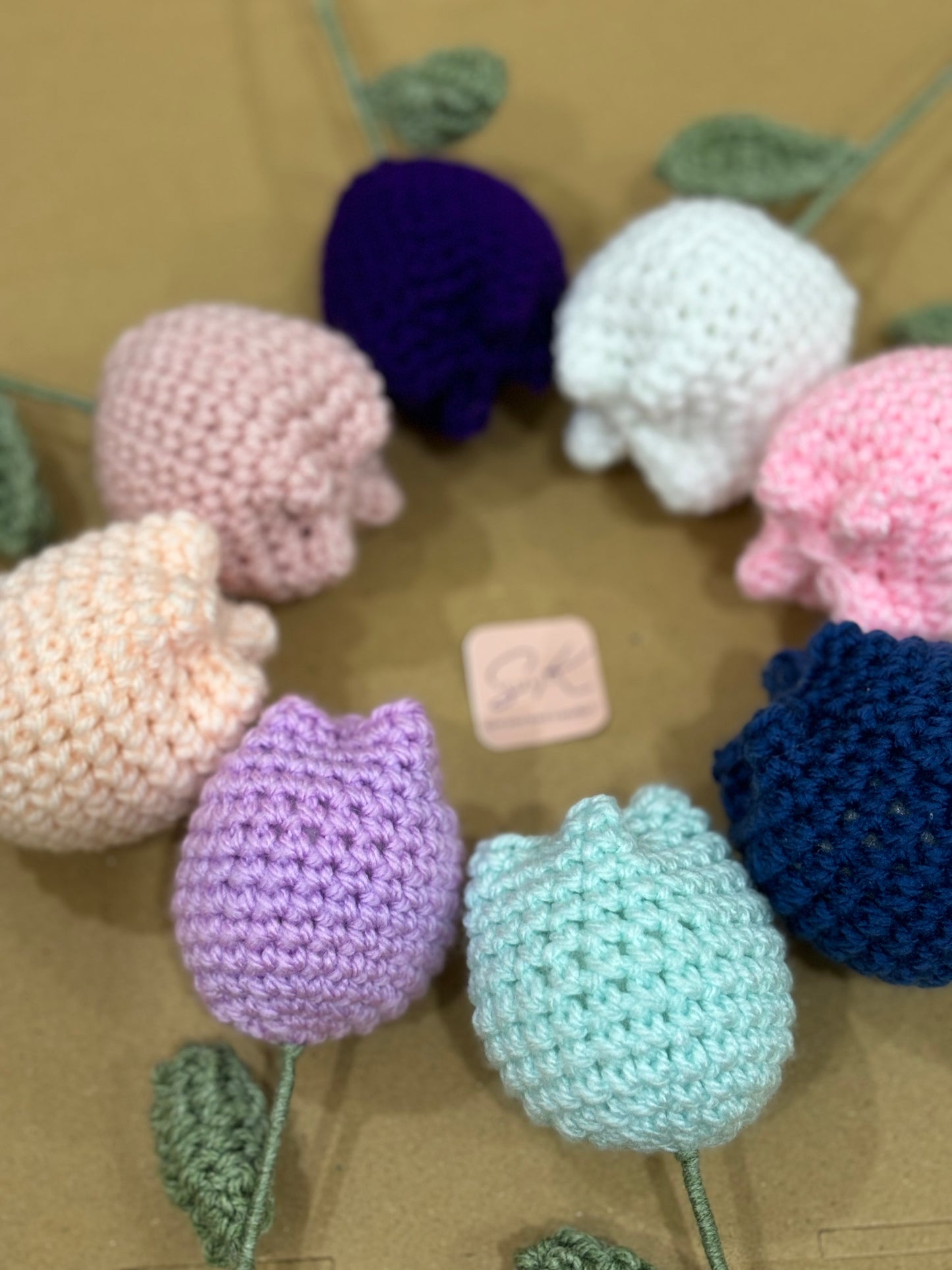 Crochet tulip with complementary khaaki wrapping