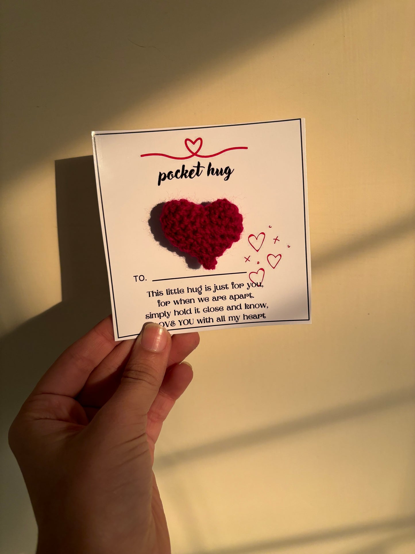 Pocket hug card with crochet heart