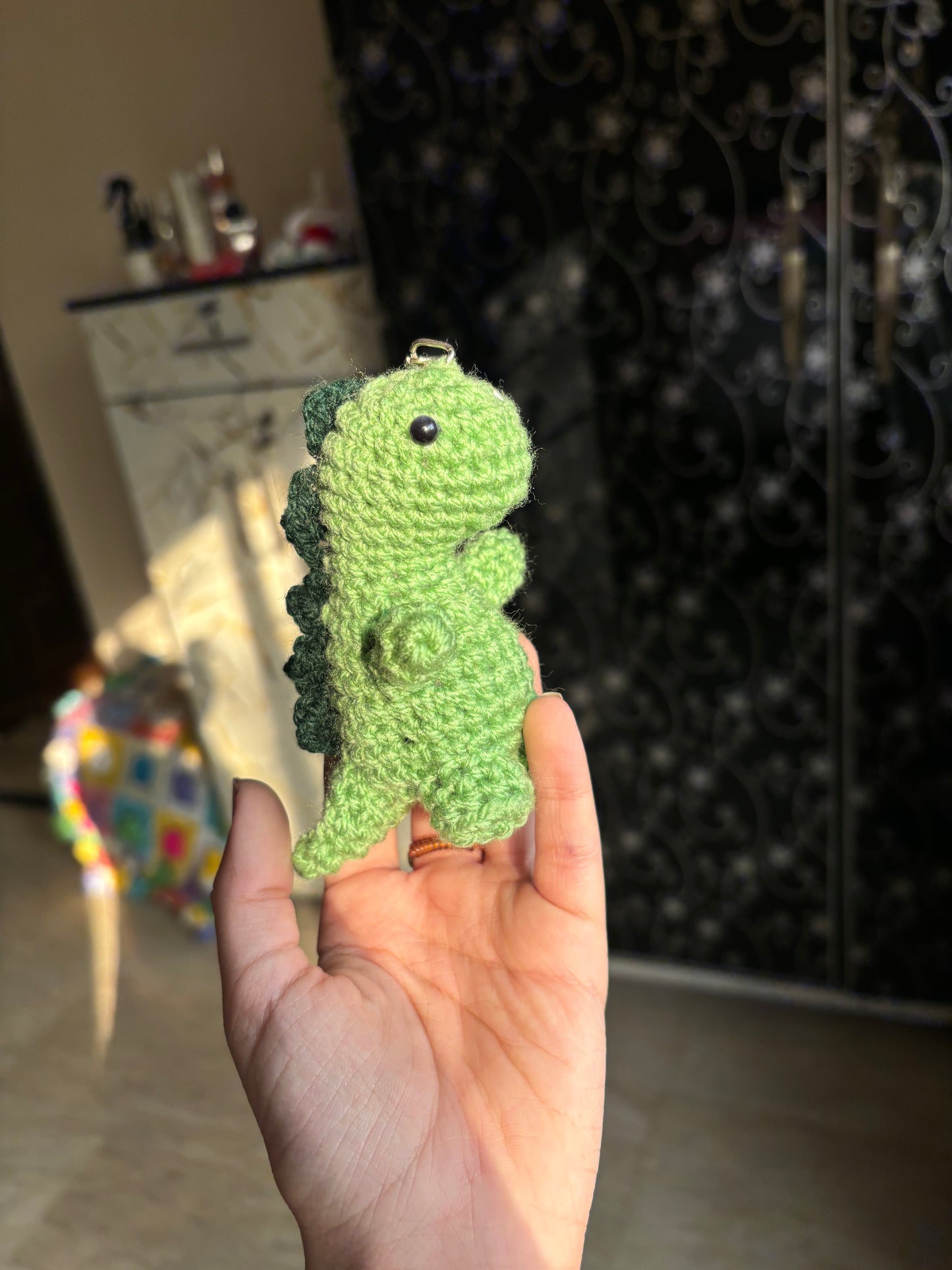 Crochet dinosaur keychain