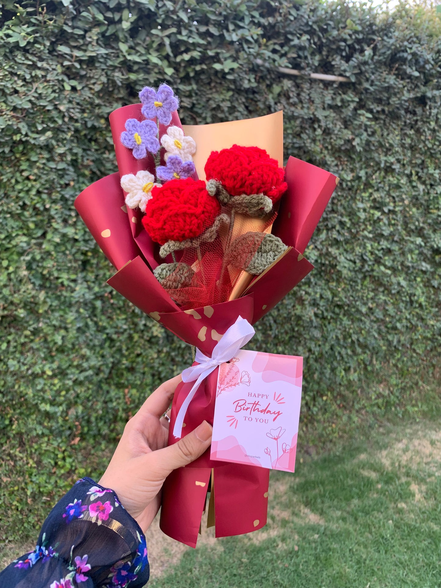 Crochet red roses bouquet with birthday card