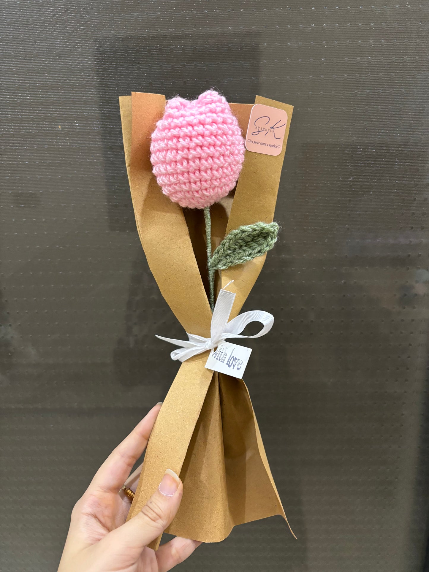 Crochet tulip with complementary khaaki wrapping