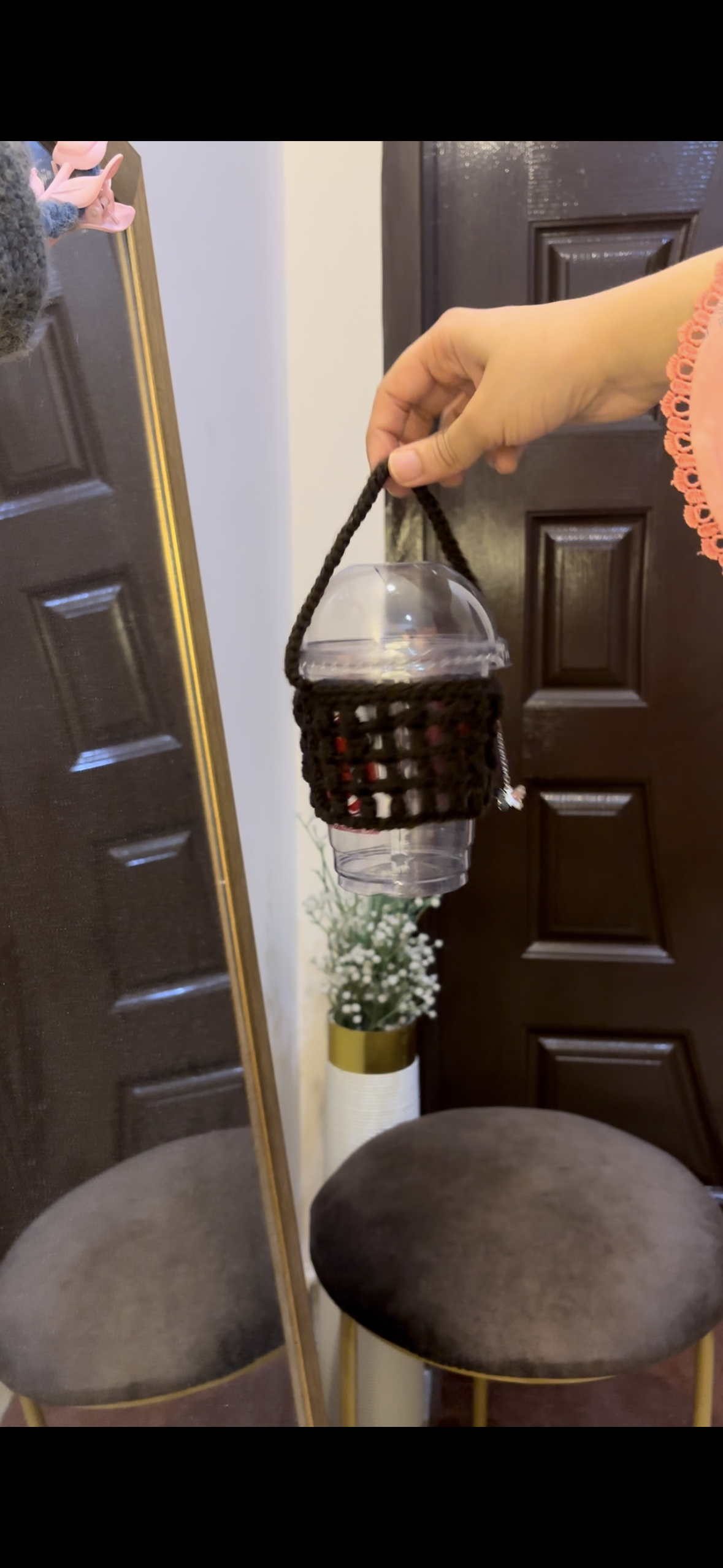 Crochet mesh cup holder with butterfly charm