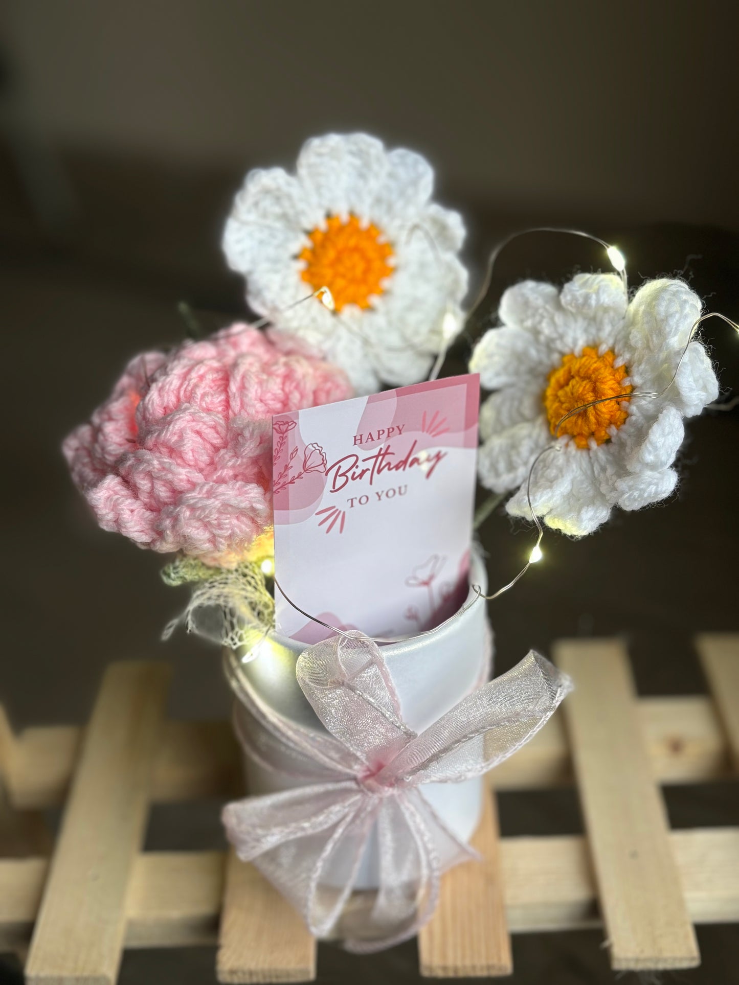 Mini bucket with crochet flowers