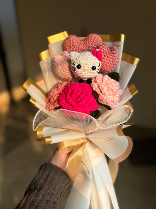 Crochet hello kitty themed bouquet with roses tulips and heart